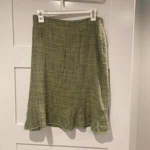 Silk green tweed skirt with ruffle hem